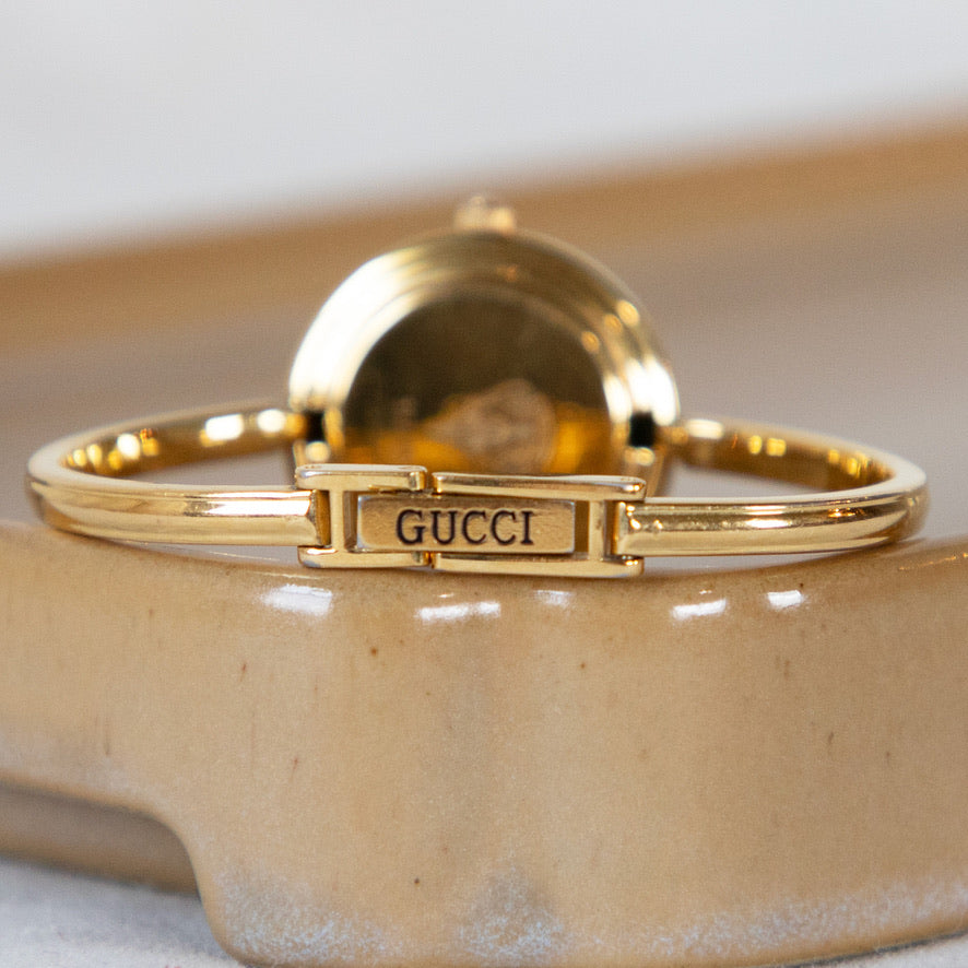 Gucci Gold-Tone Interchangeable Bezel Watch  Icarus Vintage